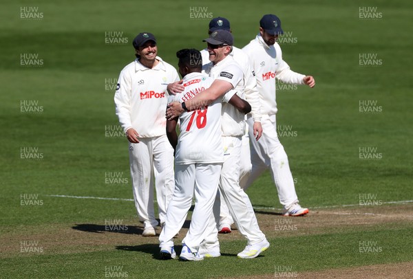 050425 - Glamorgan v Leicestershire - Rothesay County Championship Division 2 - Kiran Carlson of Glamorgan celebrates catching Sol Budinger of Leicestershire