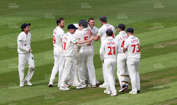 050522 - Glamorgan v Leicestershire - LV= County Championship - Division Two - Sam Northeast of Glamorgan celebrates taking the wicket of Hassan Azad with team mates