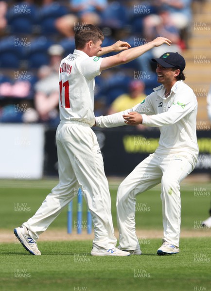 080522 - Glamorgan v Leicestershire, LV= County Championship Division 2 - Andrew Gorvin of Glamorgan celebrates with Kiran Carlson of Glamorgan after taking the wicket of Chris Wright of Leicestershire