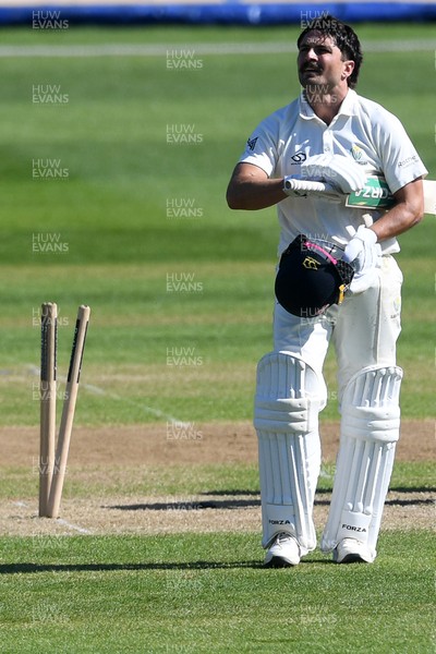 240426 - Glamorgan v Leicestershire - Rothesay County Championship - Kiran Carlson of Glamorgan is run out by Jake Weatherald of Leicestershire