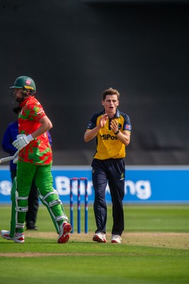 260825 - Glamorgan v Leicestershire - Metro Bank One Day Cup - Andy Gorvin of Glamorgan CCC celebrates the wicket of Sol Budinger of Leicestershire CCC