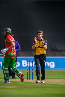260825 - Glamorgan v Leicestershire - Metro Bank One Day Cup - Andy Gorvin of Glamorgan CCC celebrates the wicket of Sol Budinger of Leicestershire CCC
