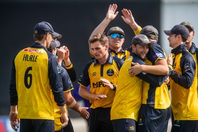 260825 - Glamorgan v Leicestershire - Metro Bank One Day Cup - Glamorgan players celebrate the wicket of Sol Budinger of Leicestershire CCC