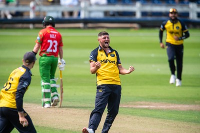 260825 - Glamorgan v Leicestershire - Metro Bank One Day Cup - Tom Horton of Glamorgan CCC celebrates the wicket of Shan Masood of Leicestershire CCC