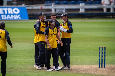 260825 - Glamorgan v Leicestershire - Metro Bank One Day Cup - Henry Hurle of Glamorgan CCC  celebrates with his teammates after running out Peter Hanscombe of Leicestershire CCC