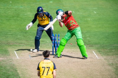 260825 - Glamorgan v Leicestershire - Metro Bank One Day Cup - Romano Franco of Glamorgan CCC bowls Roman Walker of Leicestershire CCC