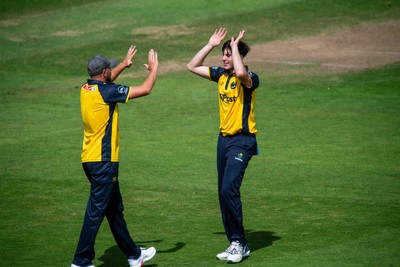 260825 - Glamorgan v Leicestershire - Metro Bank One Day Cup - Romano Franco of Glamorgan CCC celebrates a wicket with Tom Horton