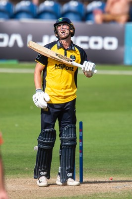 260825 - Glamorgan v Leicestershire - Metro Bank One Day Cup - Henry Hurle of Glamorgan CCC is bowled by Alex Green of Leicestershire CCC
