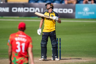 260825 - Glamorgan v Leicestershire - Metro Bank One Day Cup - Henry Hurle of Glamorgan CCC is bowled by Alex Green of Leicestershire CCC
