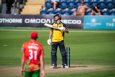 260825 - Glamorgan v Leicestershire - Metro Bank One Day Cup - Henry Hurle of Glamorgan CCC is bowled by Alex Green of Leicestershire CCC