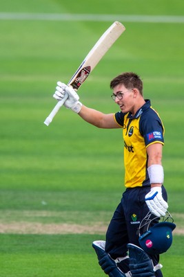 260825 - Glamorgan v Leicestershire - Metro Bank One Day Cup - Asa Tribe of Glamorgan CCC celebrates his century with Will Smale of Glamorgan CCC