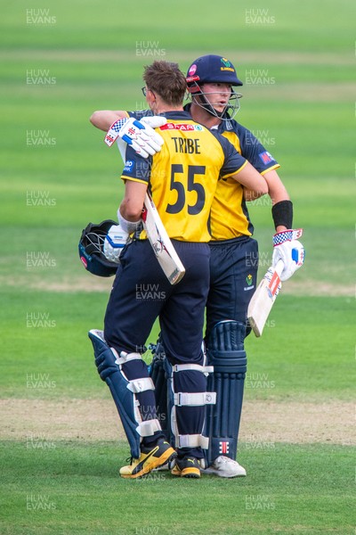 260825 - Glamorgan v Leicestershire - Metro Bank One Day Cup - Asa Tribe of Glamorgan CCC celebrates his century with Will Smale of Glamorgan CCC