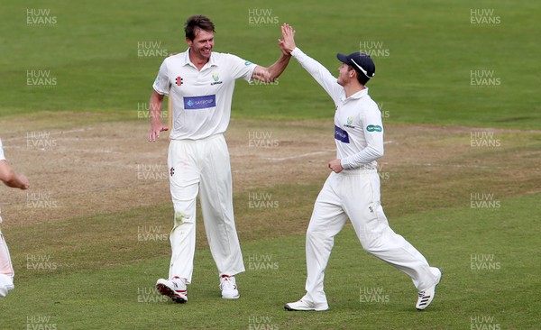 260918 - Glamorgan v Leicestershire - Specsavers County Championship Division Two - Michael Hogan of Glamorgan celebrates after Mark Cosgrove is caught by Jack Murphy