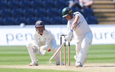 270426 - Glamorgan v Leicestershire, Rothesay County Championship Division 1 - Ben Cox of Leicestershire plays a shot as Chris Cooke of Glamorgan looks on