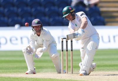 270426 - Glamorgan v Leicestershire, Rothesay County Championship Division 1 - Ben Cox of Leicestershire plays a shot as Chris Cooke of Glamorgan looks on