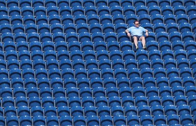 270426 - Glamorgan v Leicestershire, Rothesay County Championship Division 1 - A spectator at Sophia Gardens watches the match