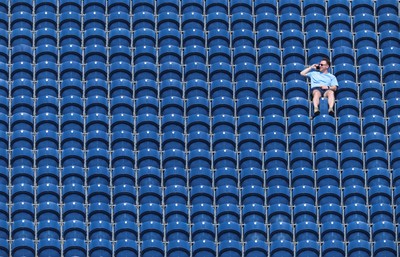 270426 - Glamorgan v Leicestershire, Rothesay County Championship Division 1 - A spectator at Sophia Gardens watches the match