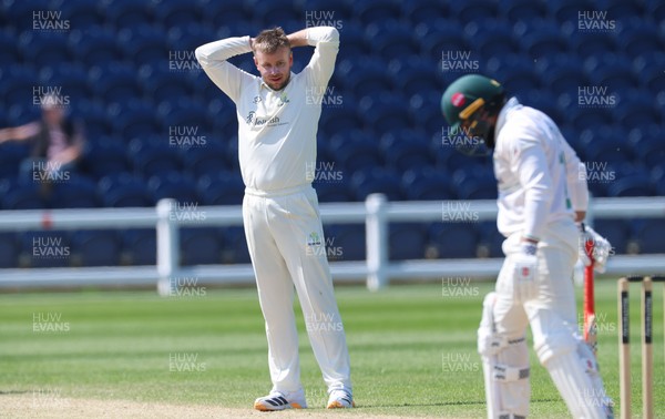 270426 - Glamorgan v Leicestershire, Rothesay County Championship Division 1 - Mason Crane of Glamorgan reacts as he fails to appeal for the wicket of Ajaz Patel of Leicestershire