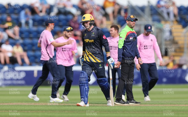 020723 - Glamorgan v Middlesex, Vitality Blast - Tom Bevan of Glamorgan  is caught and bolted by Ryan Higgins of Middlesex
