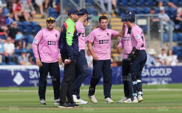 020723 - Glamorgan v Middlesex, Vitality Blast - Ryan Higgins of Middlesex is congratulated after he takes the wicket of Tom Bevan of Glamorgan