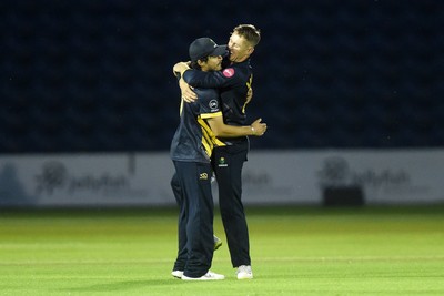 120724 - Glamorgan v Middlesex - T20, Vitality Blast - Kiran Carlson of Glamorgan celebrates with team mates after catching out Martin Anderson of Middlesex