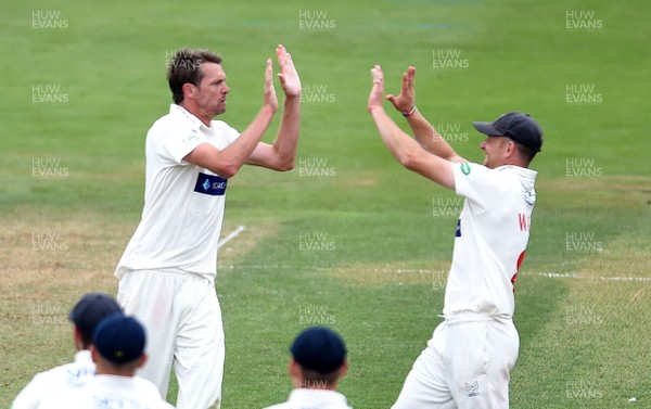 130719 - Glamorgan v Middlesex - Specsavers County Championship Division Two - Michael Hogan of Glamorgan celebrates the wicket of Robbie White of Middlesex