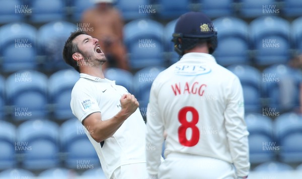 140719 - Glamorgan v Middlesex, Specsavers County Championship Division 2 - Toby Roland-Jones of Middlesex celebrates as Graham Wagg of Glamorgan is caught