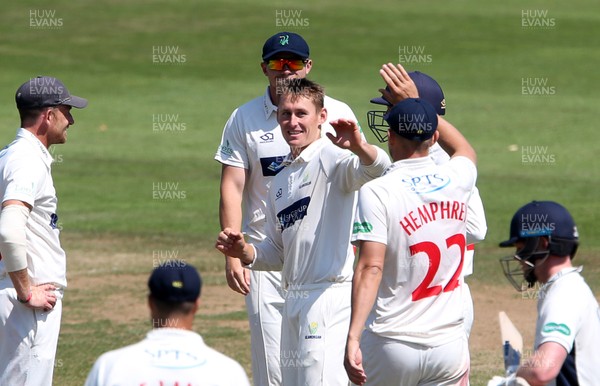 150719 - Glamorgan v Middlesex - Specsavers County Championship Division Two - Marnus Labuschagne of Glamorgan celebrates bowling and catching Tom Helm