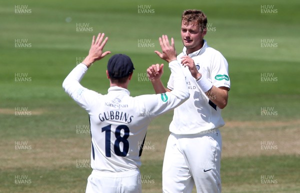 150719 - Glamorgan v Middlesex - Specsavers County Championship Division Two - Tom Helm of Middlesex celebrates after Nick Selman of Glamorgan was caught by John Simpson