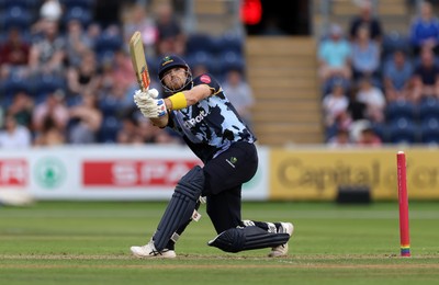 180725 - Glamorgan v Middlesex - Vitality T20 Blast - Dan Douthwaite of Glamorgan hits the ball for six runs