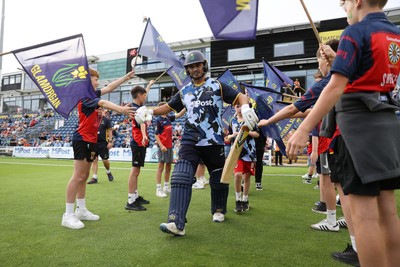 180725 - Glamorgan v Middlesex - Vitality T20 Blast - Kiran Carlson of Glamorgan walks onto the field