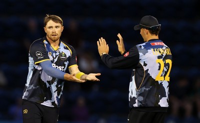 180725 - Glamorgan v Middlesex - Vitality T20 Blast - Dan Douthwaite of Glamorgan celebrates with team mates after Luke Hollman is dismissed
