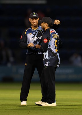 180725 - Glamorgan v Middlesex - Vitality T20 Blast - Kiran Carlson of Glamorgan celebrates with Colin Ingram after dismissing Noah Cornwell