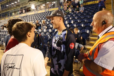 180725 - Glamorgan v Middlesex - Vitality T20 Blast - Ben Kellaway of Glamorgan signs autographs