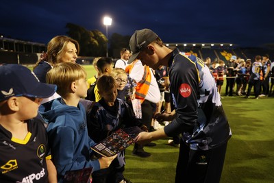 180725 - Glamorgan v Middlesex - Vitality T20 Blast - Ben Kellaway of Glamorgan signs autographs