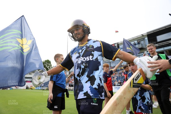 180725 - Glamorgan v Middlesex - Vitality T20 Blast - Kiran Carlson of Glamorgan walks onto the field