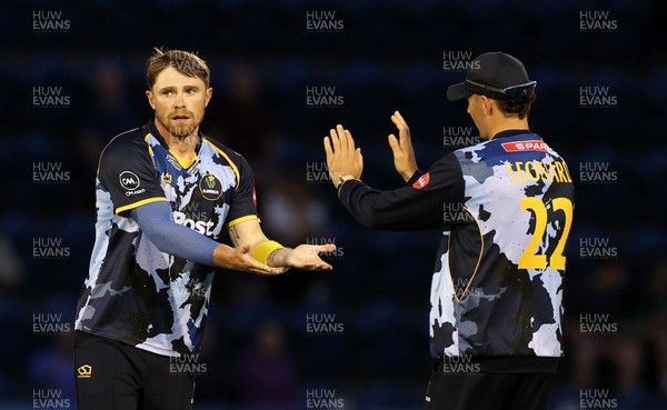 180725 - Glamorgan v Middlesex - Vitality T20 Blast - Dan Douthwaite of Glamorgan celebrates with team mates after Luke Hollman is dismissed