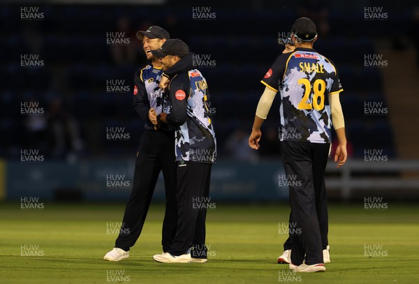 180725 - Glamorgan v Middlesex - Vitality T20 Blast - Kiran Carlson of Glamorgan celebrates with Colin Ingram after dismissing Noah Cornwell