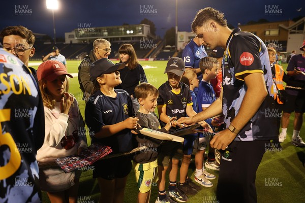 180725 - Glamorgan v Middlesex - Vitality T20 Blast - Ned Leonard of Glamorgan signs autographs