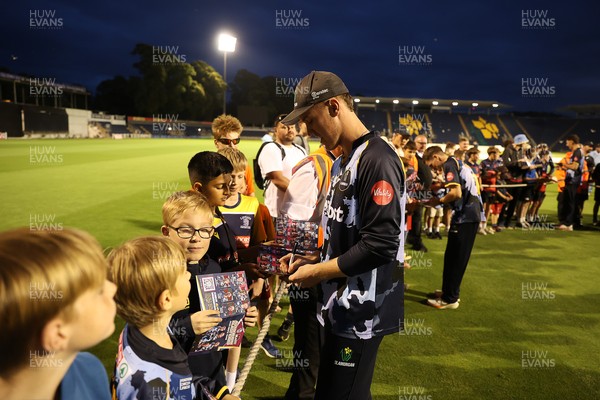 180725 - Glamorgan v Middlesex - Vitality T20 Blast - Ben Kellaway of Glamorgan signs autographs