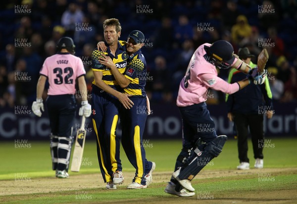 180817 - Glamorgan v Middlesex - Natwest T20 Blast - Michael Hogan of Glamorgan celebrates with Graham Wagg as he bowls Stevie Eskinazi of Middlesex