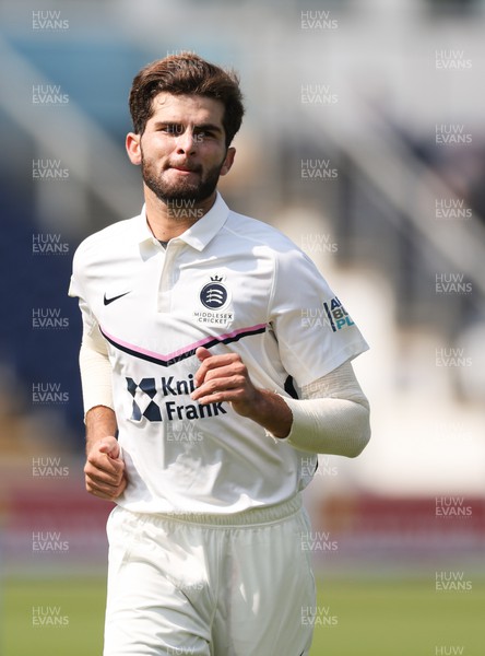 210422 - Glamorgan v Middlesex, LV= County Championship Division 2  - Shaheen Afridi of Middlesex acknowledges the crowd after taking the wicket of Marnus Labuschagne and Sam Northeast of Glamorgan in an over