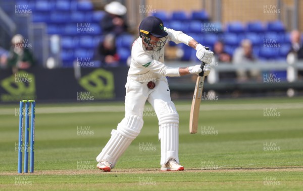210422 - Glamorgan v Middlesex, LV= County Championship Division 2  - James Harris of Glamorgan is struck by the ball