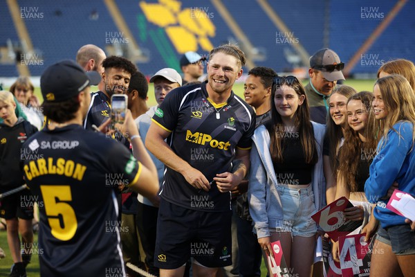 210622 - Glamorgan v Middlesex Sharks - Vitality T20 Blast - Players sign autographs after the game