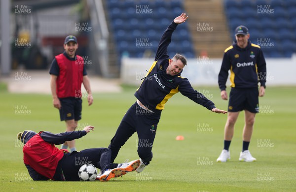 220422 - Glamorgan v Middlesex, LV= County Championship Division 2  - Chris Cooke of Glamorgan makes a dramatic play dive during warm up ahead of the match
