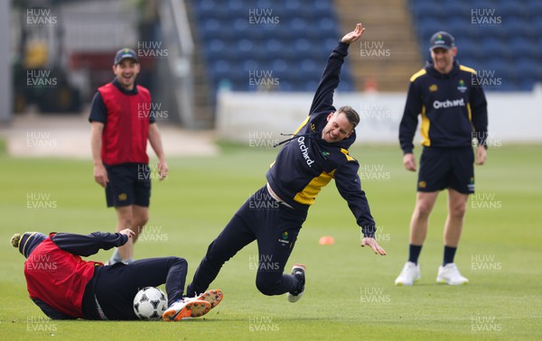 220422 - Glamorgan v Middlesex, LV= County Championship Division 2  - Chris Cooke of Glamorgan makes a dramatic play dive during warm up ahead of the match