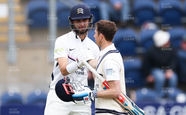 220422 - Glamorgan v Middlesex, LV= County Championship Division 2  - John Simpson of Middlesex is congratulated by Shaheen Afridi of Middlesex on reaching his 100