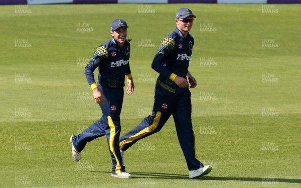 230518 - Glamorgan v Middlesex - Royal London One Day Cup - Aneurin Donald celebrates with Andrew Salter after catching Hilton Cartwright