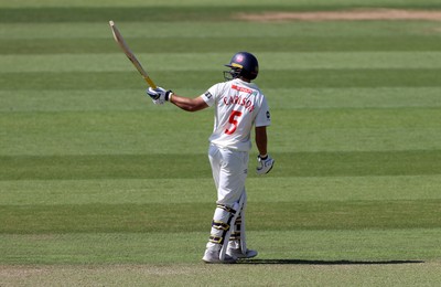 230525 - Glamorgan v Middlesex - Rothesay County Championship, Division Two - Kiran Carlson of Glamorgan acknowledges his half century