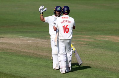 230525 - Glamorgan v Middlesex - Rothesay County Championship, Division Two - Sam Northeast of Glamorgan celebrates scoring a century with Kiran Carlson